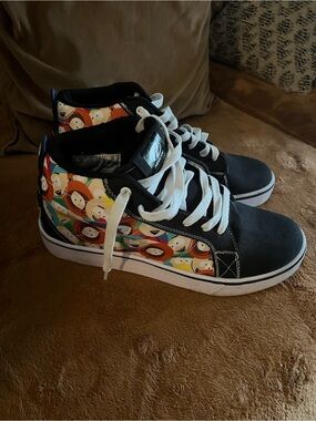 Heelys Black High-Top Sneakers with White Laces and Colorful Cartoon Panels